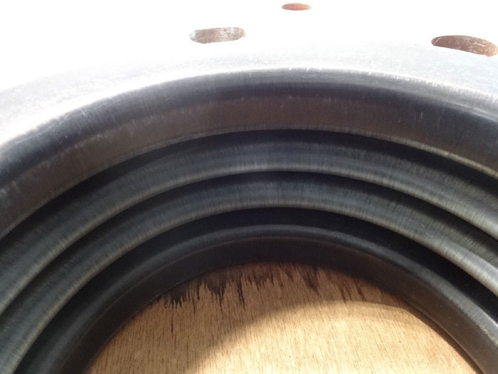 6" Expansion Joint, Black PTFE Lined, Carbon Steel Flanges